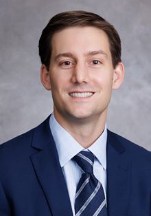 John F. Stockman, MD